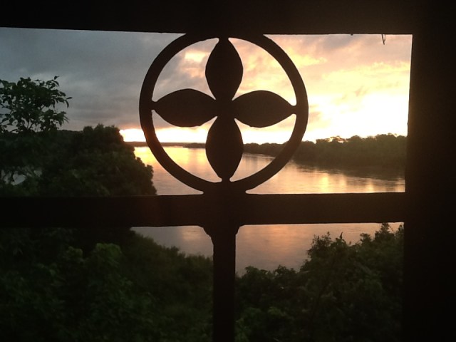 sunrise through the balcony railing , from a room at Chilo Gorge